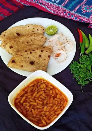 A picture of Khandeshi special zanzanit Sev bhaji(curry).