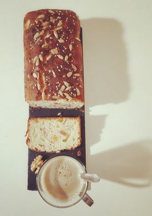 Une photo de Cake brioché aux fruits secs et aux coings ☕