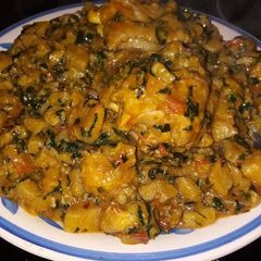 Plantain porriage with fresh tomatoes and vegetable A picture of Plantain porriage with fresh tomatoes and vegetable.