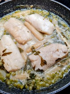 Una foto de Merluza en salsa verde