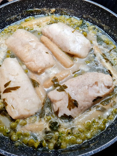 Una foto de Merluza en salsa verde