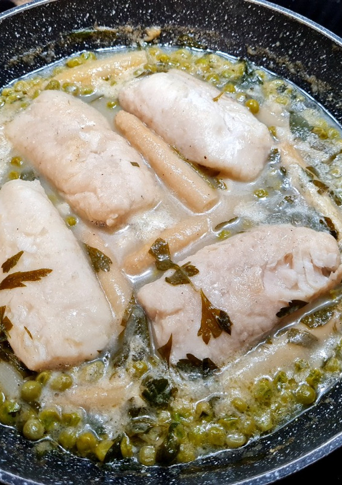 Una foto de Merluza en salsa verde