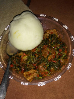 A picture of Pounded yam with green souce by Ayshat.