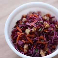 A picture of Nutty coleslaw with red cabbage, carrot and cranberry.