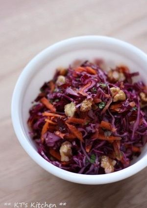 A picture of Nutty coleslaw with red cabbage, carrot and cranberry.