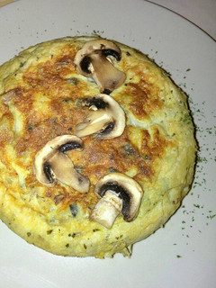 Una foto de Tortilla de patata y champiñones