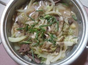 Hình của món Gan xào sú và hành tây.