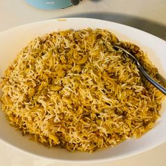 A picture of Chicken keema biryani mix with macaroni (Rice with ground chicken and mix with macaroni).