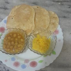 Chana masala with poori A picture of Chana masala with poori.