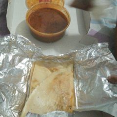 A picture of Sambhar dosa.