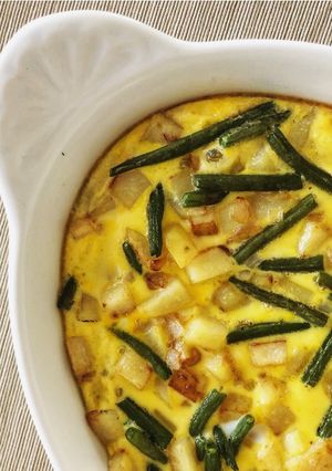 A picture of Tortilla with Potatoes and Green Beans.