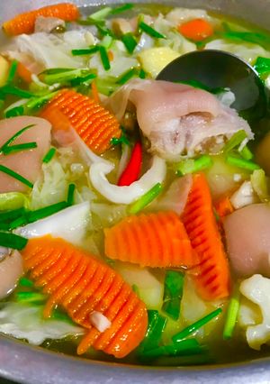 A picture of Pork Hock Stew with Vegetables (Carrots, Potatoes, Cabbage).