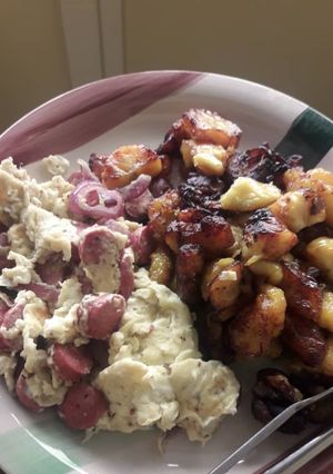 A picture of Blessing’s Fried sauté egg & sausages and plantain.