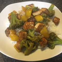 A picture of Cauliflower and tofu with basmati rice.