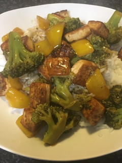 A picture of Cauliflower and tofu with basmati rice.