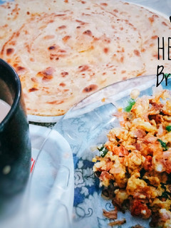A picture of Egg khageena with Paratha & Hot Tea!.