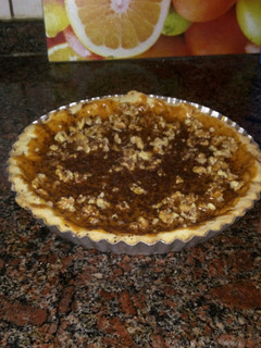 Una foto de Tarta de dulce de leche y nueces