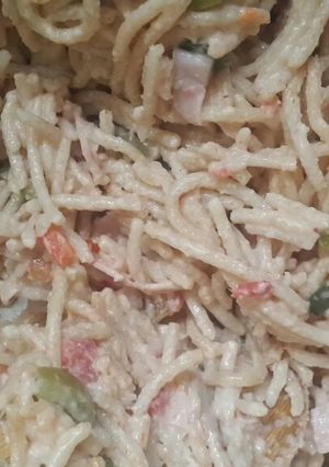 Una foto de Spaghettis integrales con verduras y crema