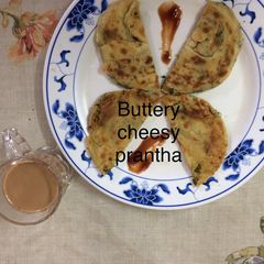 A picture of Buttery cheesy Parantha.