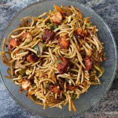 A picture of Fish 65 and egg noodles.