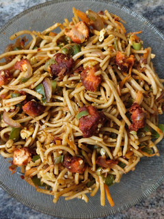 A picture of Fish 65 and egg noodles.