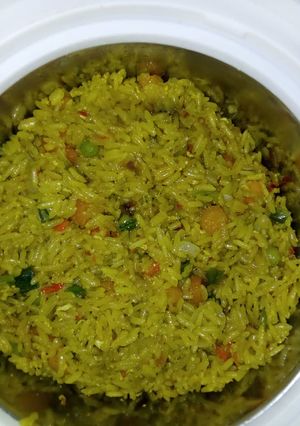 A picture of Jollof rice with carrot.