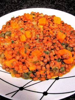 Una foto de Lentejas vegana con calabaza y kamut