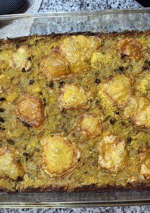 Una foto de Pizza de papa y cebolla