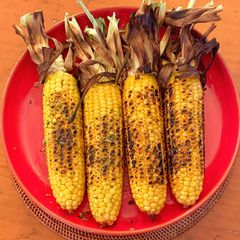 A picture of Charred corn, green chilli and lime.