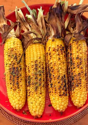 A picture of Charred corn, green chilli and lime.