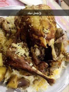 صورة لوصفة ديك رومي بالخضار مطبوخ بقدرالمندي المنزلي المن