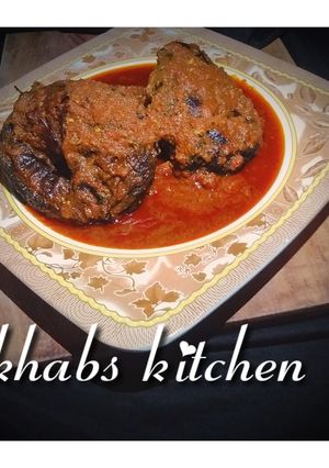 A picture of Dried fish palm oil stew.