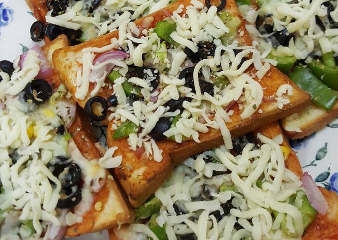 Bread pizza (dhara kitchen recipes) Recipe