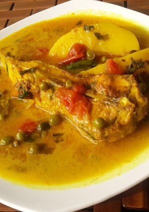 A picture of Chitol fish with tomato and pea carry (jul).