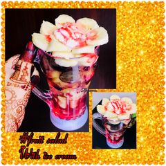 A picture of Fruit salad with ice cream.