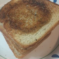 A picture of Toast with Butter and Black Pepper.