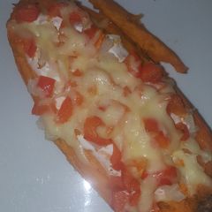 A picture of Loaded sweet potatoe skins.