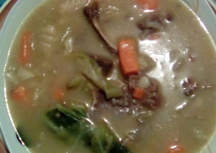 Vegetable soup with bones
