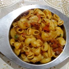 A picture of Simple Italian Breakfast. Masala Macroni.