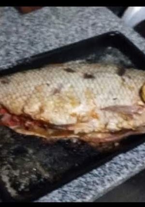 Una foto de Sábalo o carpa rellena al horno