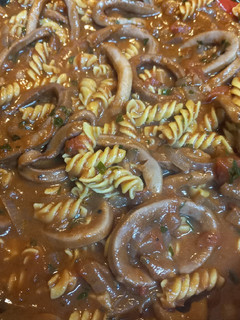 A picture of Calamari stewed in Tomatoes.