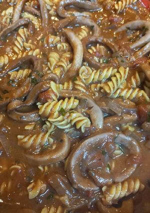 A picture of Calamari stewed in Tomatoes.