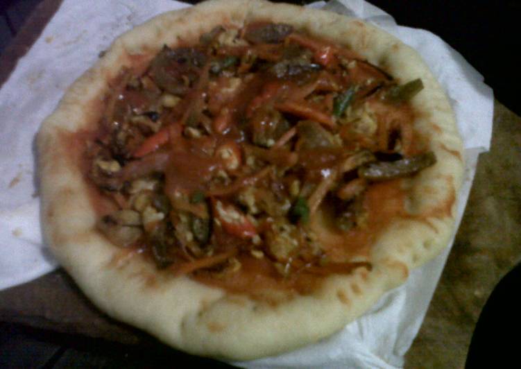 Pizza topping bakso and saus pecel