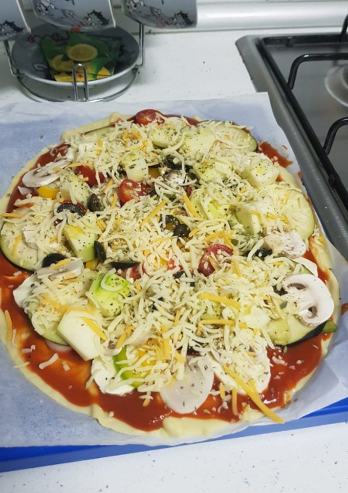 Una foto de Pizza vegetal