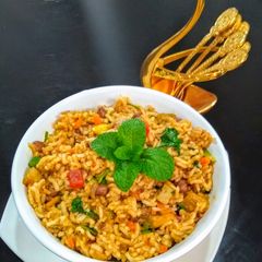 A picture of Schezwan Veg Biryani.