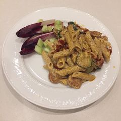 A picture of Wholewheat pasta with sun- dried tomatoes, courgette and chorizo.