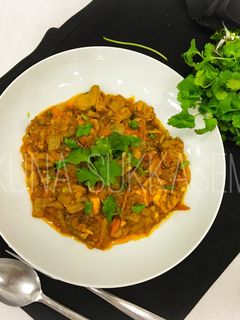 รูปของ ไก่ผัดหัวหอมและมะเขือเทศ (สไตล์เนปาล)