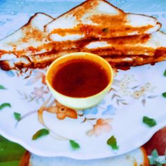 Tasty crispy schezwan chutney sandwich A picture of Tasty crispy schezwan chutney sandwich.