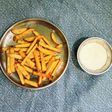 French Fries And Cheese Sauce