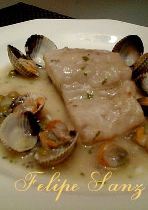 Foto principal de Lomos de bacalao en salsa con berberechos